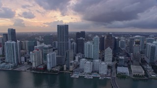 AX0172_176 - 6.7K aerial stock footage fly over Brickell Key and skyscrapers in Downtown Miami, Florida at sunset, reveal Little Havana