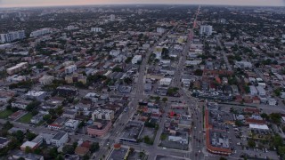AX0172_180 - 6.7K aerial stock footage of streets in Little Havana neighborhood at sunset, Miami, Florida
