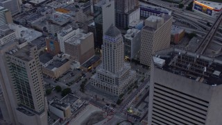 AX0172_190 - 6.7K aerial stock footage of orbiting the courthouse at sunset, Downtown Miami, Florida