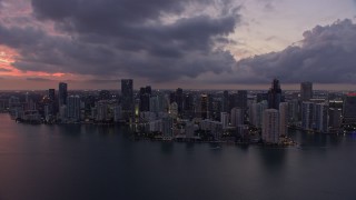 AX0172_209 - 6.7K stock footage aerial video of flying over Downtown Miami skyscrapers to reveal Little Havana at twilight, Florida