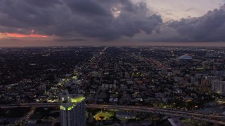 AX0172_210 - 6.7K aerial stock footage of flying over Little Havana at twilight, Miami, Florida