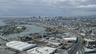 AX0173_0003 - 6K stock footage aerial video of approaching the Downtown Oakland skyline, California