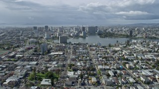 AX0173_0006 - 6K aerial stock footage of approaching Lake Merritt and Downtown Oakland, California