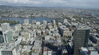 AX0173_0010 - 6K aerial stock footage of flying toward Lake Merritt from downtown, Oakland, California