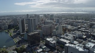 AX0173_0023 - 6K aerial stock footage of circling downtown office buildings in Oakland, California