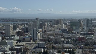 AX0173_0024 - 6K aerial stock footage of flying past downtown office buildings in Oakland, California