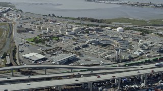AX0173_0026 - 6K aerial stock footage of a water treatment plant in Oakland, California