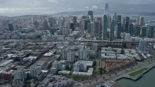 AX0173_0037 - 6K aerial stock footage tilt from South of Market, reveal and approach Salesforce Tower, San Francisco, California