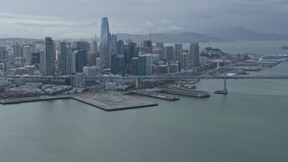 AX0173_0044 - 6K aerial stock footage of the city's skyline seen from the bay, Downtown San Francisco, California