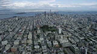 AX0173_0064 - 6K stock footage aerial video approach Downtown San Francisco skyline from Pacific Heights, California