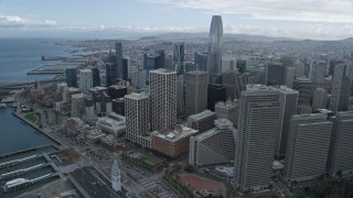 AX0173_0068 - 6K stock footage aerial video a reverse view of skyscrapers in Downtown San Francisco, California