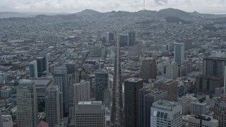 AX0173_0075 - 6K aerial stock footage follow Market Street toward office buildings, San Francisco, California