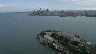 AX0173_0086 - 6K aerial stock footage of the San Francisco skyline seen from Alcatraz, California