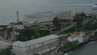 AX0173_0088 - 6K aerial stock footage approach and ascend over Alcatraz, California