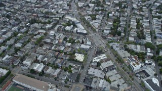 AX0173_0115 - 6K aerial stock footage of Market Street and apartment buildings in the Castro District, San Francisco, California