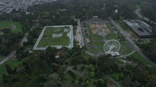 AX0173_0118 - 6K aerial stock footage of the California Academy of Sciences and Music Concourse, Golden Gate Park, San Francisco, California