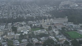 AX0173_0119 - 6K aerial stock footage flyby and approach St. Ignatius Church in the Inner Richmond District, San Francisco, California