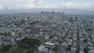 AX0173_0122 - 6K aerial stock footage tilt from Western Addition to reveal Downtown San Francisco skyline, California