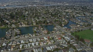 AX0173_0134 - 6K aerial stock footage of waterfront homes in Alameda, California