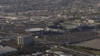 AX0174_0001 - 6K aerial stock footage of the arena and stadium in Oakland, California
