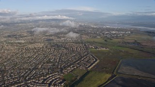 AX0174_0010 - 6K aerial stock footage of a wide view of suburban neighborhoods in Union City, California