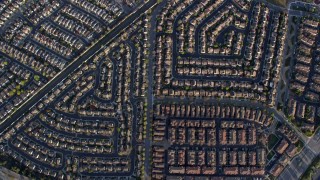 AX0174_0012 - 6K aerial stock footage of a bird's eye view of Union City tract homes, California