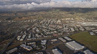 AX0174_0016 - 6K aerial stock footage of flying past Fremont warehouse buildings, California