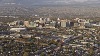 AX0174_0036 - 6K aerial stock footage of a static view of Downtown San Jose at sunset, California