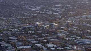 AX0174_0048 - 6K aerial stock footage of office buildings at sunset, Sunnyvale, California