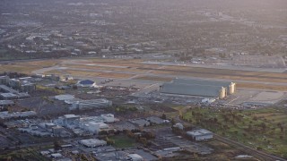 AX0174_0049 - 6K aerial stock footage of Moffett Field at sunset, Mountain View, California