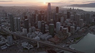 AX0174_0082 - 6K stock footage aerial video of flying by Downtown San Francisco at sunset, California