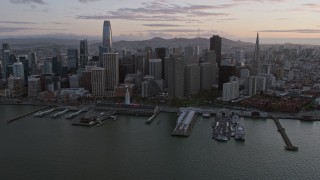 AX0174_0084 - 6K aerial stock footage flyby Downtown San Francisco skyscrapers at sunset, California