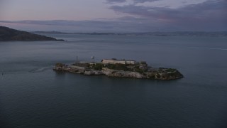 AX0174_0095 - 6K stock footage aerial video of orbiting Alcatraz at twilight, San Francisco, California