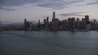 AX0174_0098 - 6K aerial stock footage of a view of the Downtown San Francisco skyline at twilight, California