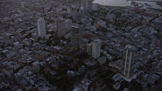 AX0174_0105 - 6K aerial stock footage of apartment buildings at twilight in Russian Hill, San Francisco, California