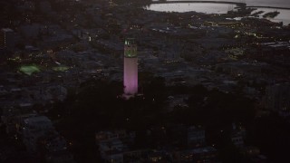 AX0174_0122 - 6K stock footage aerial video of orbiting Coit Tower at twilight, San Francisco, California