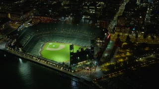 AX0174_0141 - 6K aerial stock footage orbit Oracle Park stadium at night, San Francisco, California