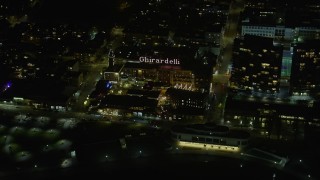 AX0174_0171 - 6K stock footage aerial video of Ghirardelli Square at night, San Francisco, California