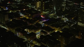 AX0174_0189 - 6K aerial stock footage of passing by Chinatown at night, San Francisco, California