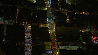 AX0174_0190 - 6K aerial stock footage a view of Grant Ave at night in Chinatown, San Francisco, California