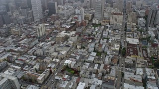 AX0175_0011 - 6K aerial stock footage of office and apartment buildings in Nob Hill and Chinatown, San Francisco on a foggy day, California