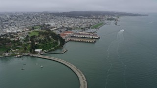 AX0175_0025 - 6K aerial stock footage fly over Aquatic Park and Fort Mason to approach Marina District, San Francisco, California