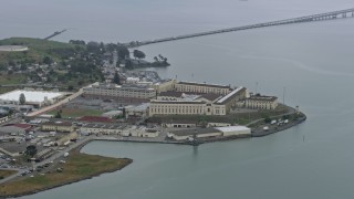 AX0175_0042 - 6K aerial stock footage of San Quentin State Prison on a foggy day, California