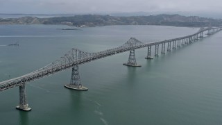 AX0175_0049 - 6K stock footage aerial video approach and fly beside the Richmond Bridge, California