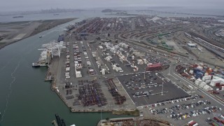 AX0175_0084 - 6K aerial stock footage of shipping containers at the Port of Oakland, California
