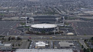 AX0175_0090 - 6K aerial stock footage of an arena and stadium in Oakland, California