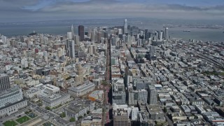 AX0175_0120 - 6K stock footage aerial video follow Market Street toward Downtown San Francisco, California