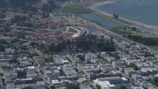 AX0175_0142 - 6K aerial stock footage of passing by the Palace of Fine Arts in San Francisco, California