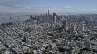 AX0175_0143 - 6K stock footage aerial video of approaching Downtown San Francisco skyline from Russian Hill, California