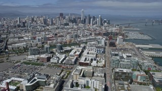 AX0175_0149 - 6K stock footage aerial video of flying over South of Market to approach Downtown San Francisco, California